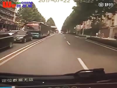 Woman gets run over by a bus