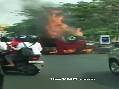 Man is burned alive as upturned van bursts into flames