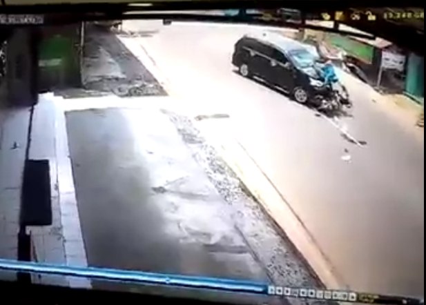 Car Flips Motorcyclist Upside Down