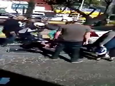 Two Thieves Get Beaten With Motorbike Helmets
