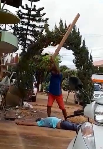 Man Gets Brutally Beaten With a Large Plank of Wood