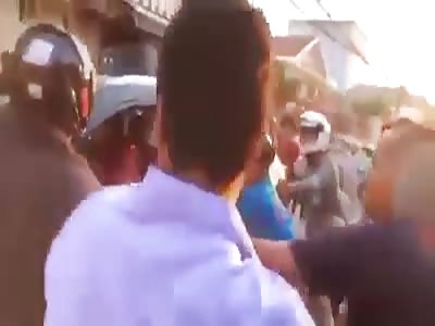 Damn! Man Gets Knocked out With Bricks in His Car by Angry Mob