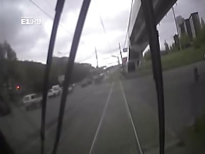 Kid Looking The Wrong Way Gets Run Over by a Tram