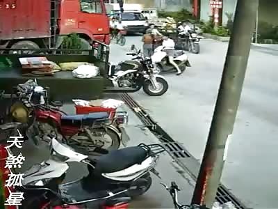 Chinese Cyclist Crushed by Truck 