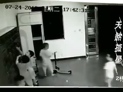 Kid Gets Pinned to Floor by Mailboxes in China