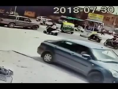 Damn!! Biker gets Crushed Between Two Cars 