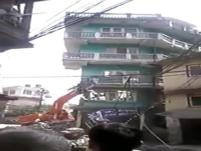 Building Collapses onto Crane Driver in Kathmandu, Killing Him