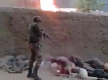 Brutal: Villagers Lined up and Executed With Assault Rifle Fire 