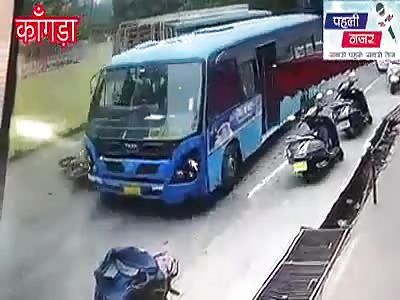 Biker Slides Under the Bus to His Death