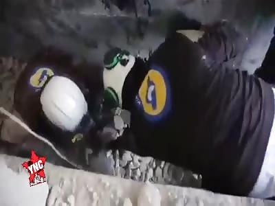 Rescue baby body under rubble