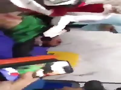 Militia of the ruling parties suffocating the wounded in a hospital