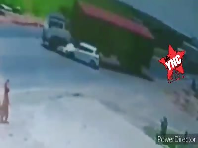 car is crushed by truck