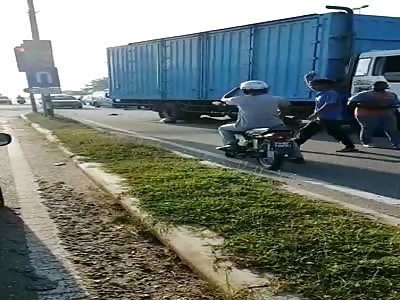 motorcyclist is crushed by truck