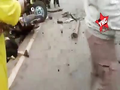 Motorcyclist crushed by truck