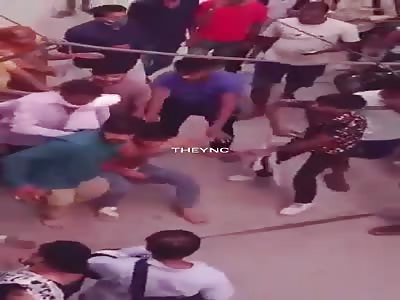 Man brutally beaten by mob of people