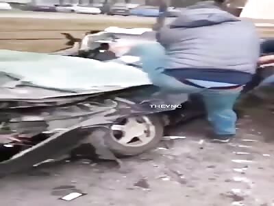 Russian tank crushes civilian car in Ukraine