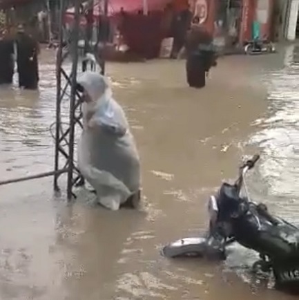 Guy Touches Electricity Pole During Flooding.
