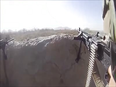 Shooting a powerful machine gun in the Middle East against Syrian rebels