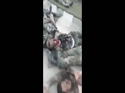 DAMASCUS Al_QADAM - - The bodies of the 100  bodies of the killed SAA fighters inside Al-Q