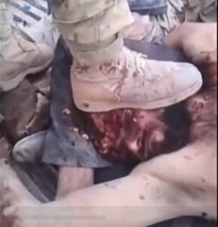 the Syrian rebels presume and have fun the corpses of their victims