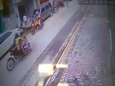 the man runs over a young man with his motorcycle and then wants to escape