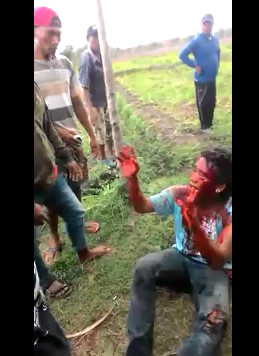 Thief beaten in Indonesia .
