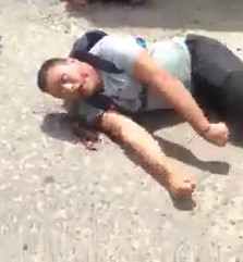 Shock Video shows a Man Convulsing in the Street before Death 
