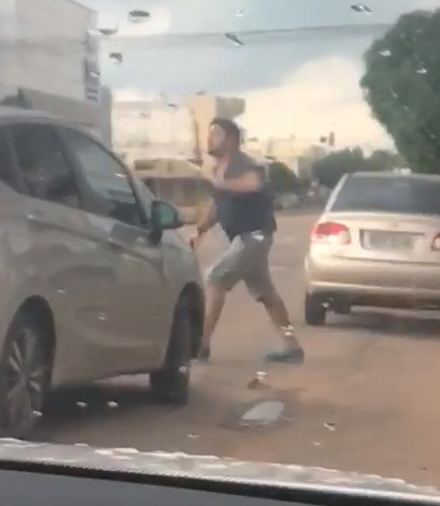 Furious Woman Runs Over a Man after Arguing in Middle of the Street