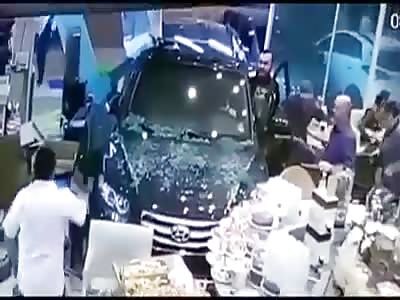 Car invades bakery