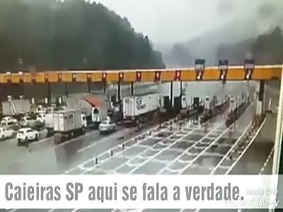 Truck collapses construction with driven mechanical arm