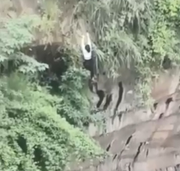 Girl Falls Off The Cliff In China