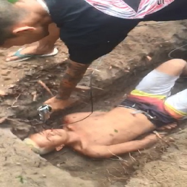Dude Brutally Executed In Shallow Grave 