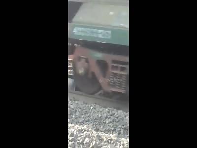 Drunk man unhurt as he lies on track and train passes over him