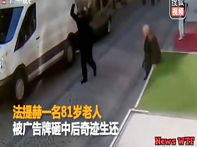 80y old man taking a break from walking gets hit by a sign