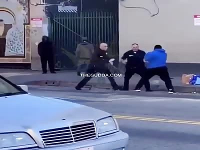 Dude And 2 Cops Throw Hands In The Middle Of The Street!