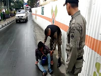 Beggar pretending to be disabled were arrested by local government off