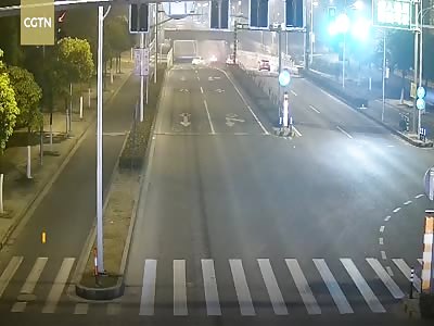 Drunk driver flips car over guardrails in Shanghai