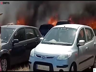 200 vehicles were destroyed by a fire which swept through an Air Force