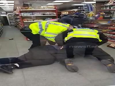 Shocking moment 'heavy-handed' cops repeatedly knee man