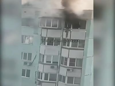 Mother Throws her Son From Burning Building