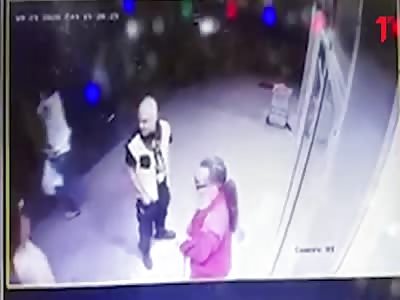 Security guard knocks out a woman