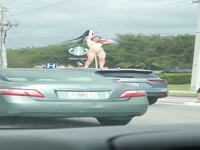 Florida Woman dances naked on car 