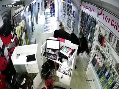 Holy Cow robs Phone Store in India