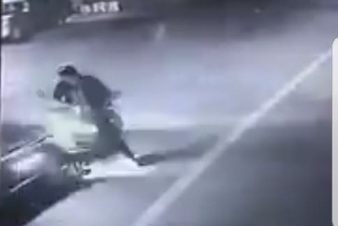 Woman on Moped Obliterated