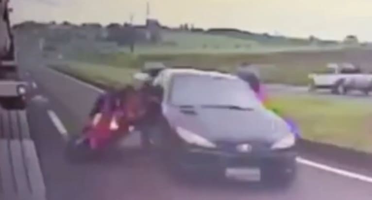 Car Causes Bikers to Fall Under Wheels of a Semi