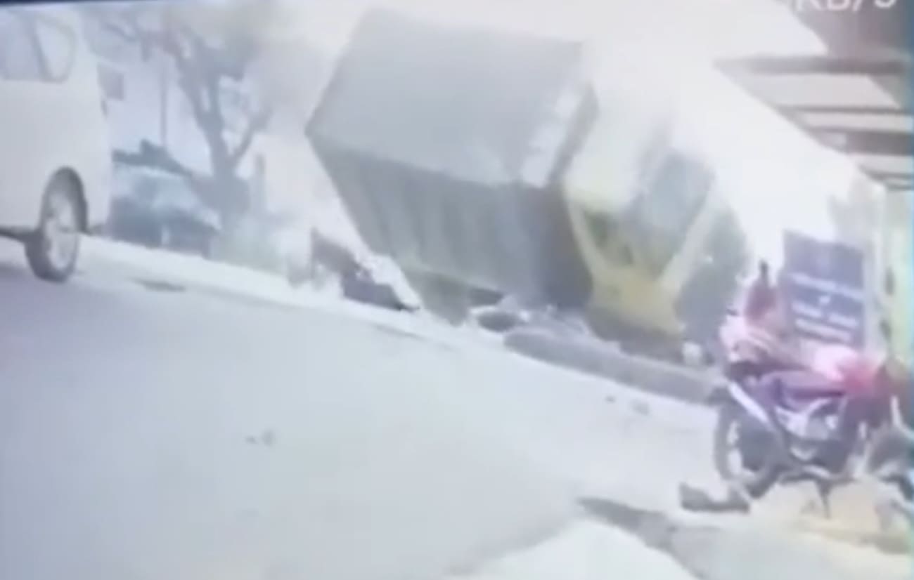 Biker Gets Flattened by Dump Truck