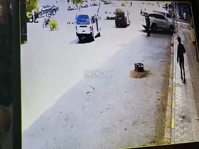 Car Slams into Lady Carrying Her Kid
