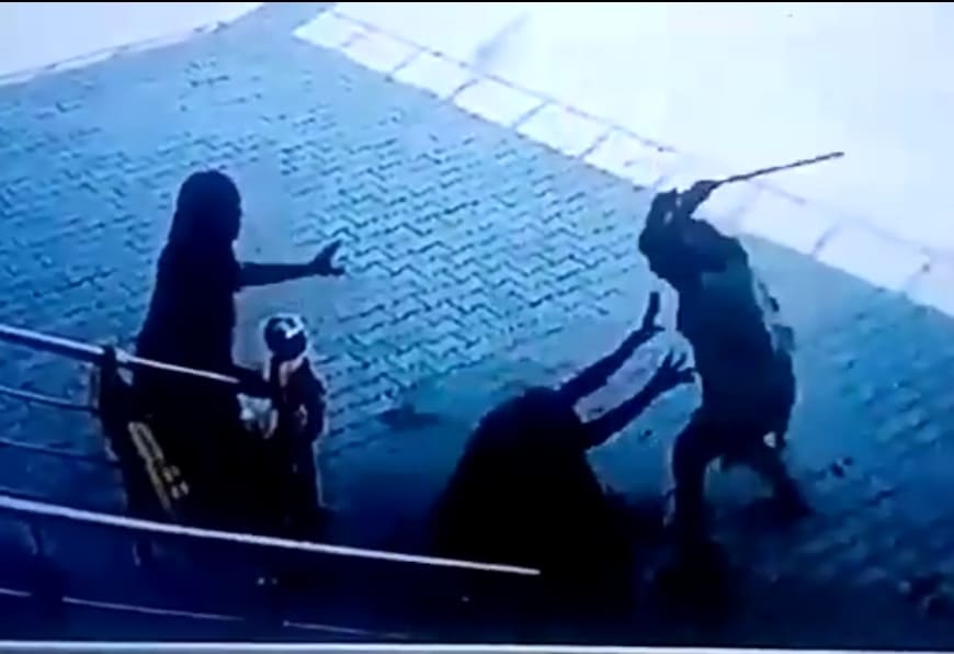 Daughter Beats Woman with Stick After Insulting Her Mother