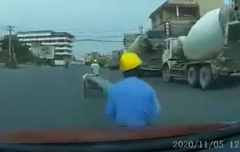 Road Worker Takes a Pole to the Face