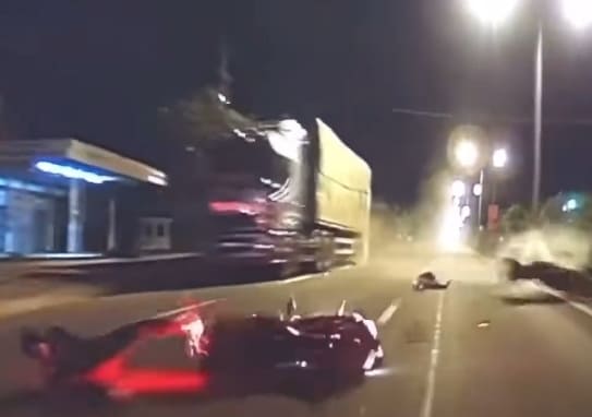 Ouch: Biker Slams Into Parked Truck